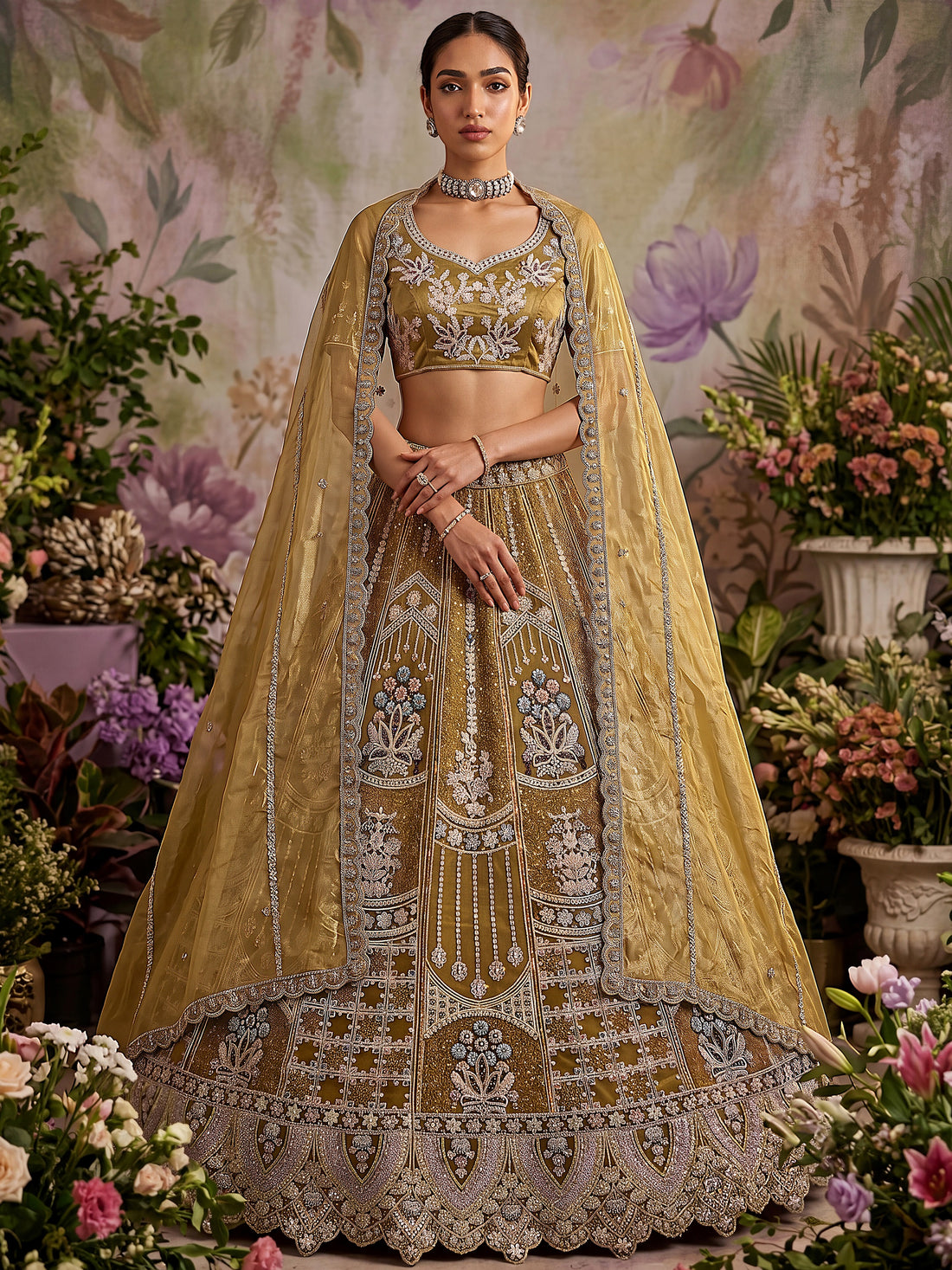 Gorgeous Golden Embroidered Net Wedding Wear Lehenga Choli With Dupatta