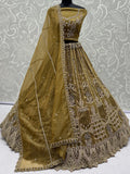 Gorgeous Golden Embroidered Net Wedding Wear Lehenga Choli With Dupatta
