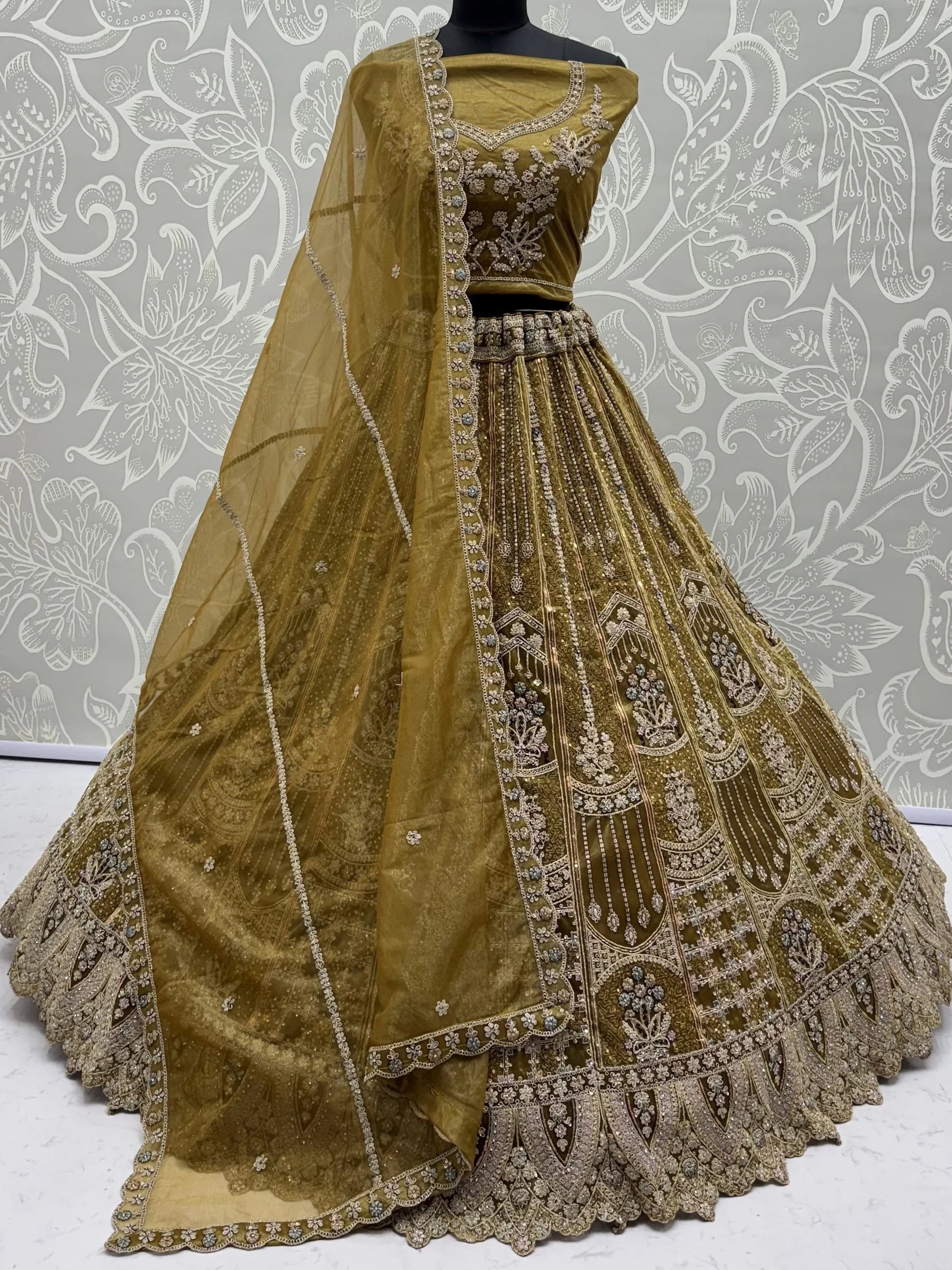 Gorgeous Golden Embroidered Net Wedding Wear Lehenga Choli With Dupatta