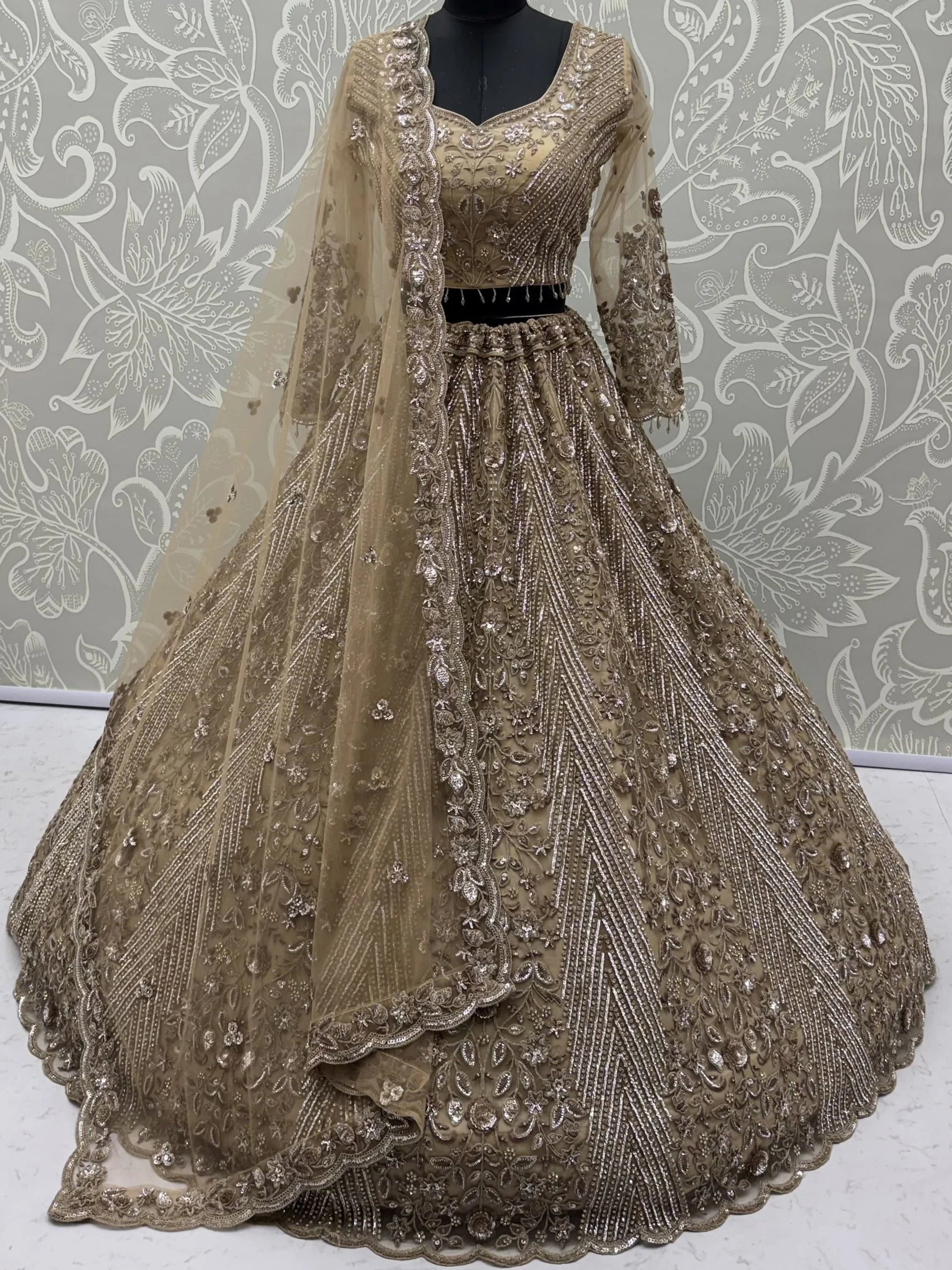 Glowing Beige Embroidery Net Reception Wear Lehenga Choli With Dupatta