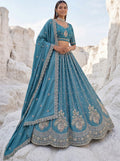Attractive Teal Blue Embroidered Silk Engagement Wear Lehenga Choli With Dupatta