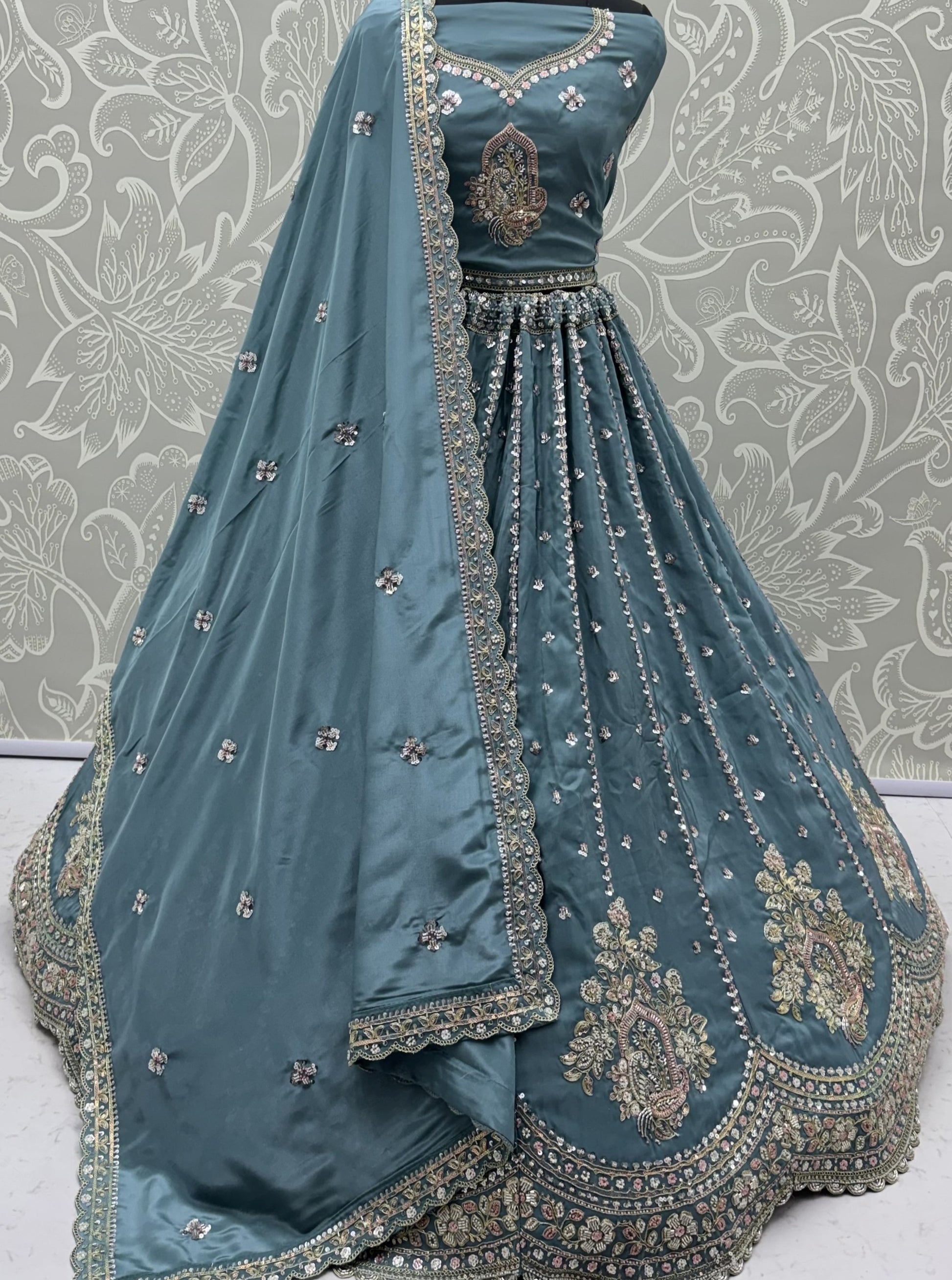 Attractive Teal Blue Embroidered Silk Engagement Wear Lehenga Choli With Dupatta