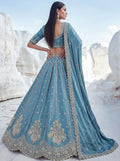 Attractive Teal Blue Embroidered Silk Engagement Wear Lehenga Choli With Dupatta