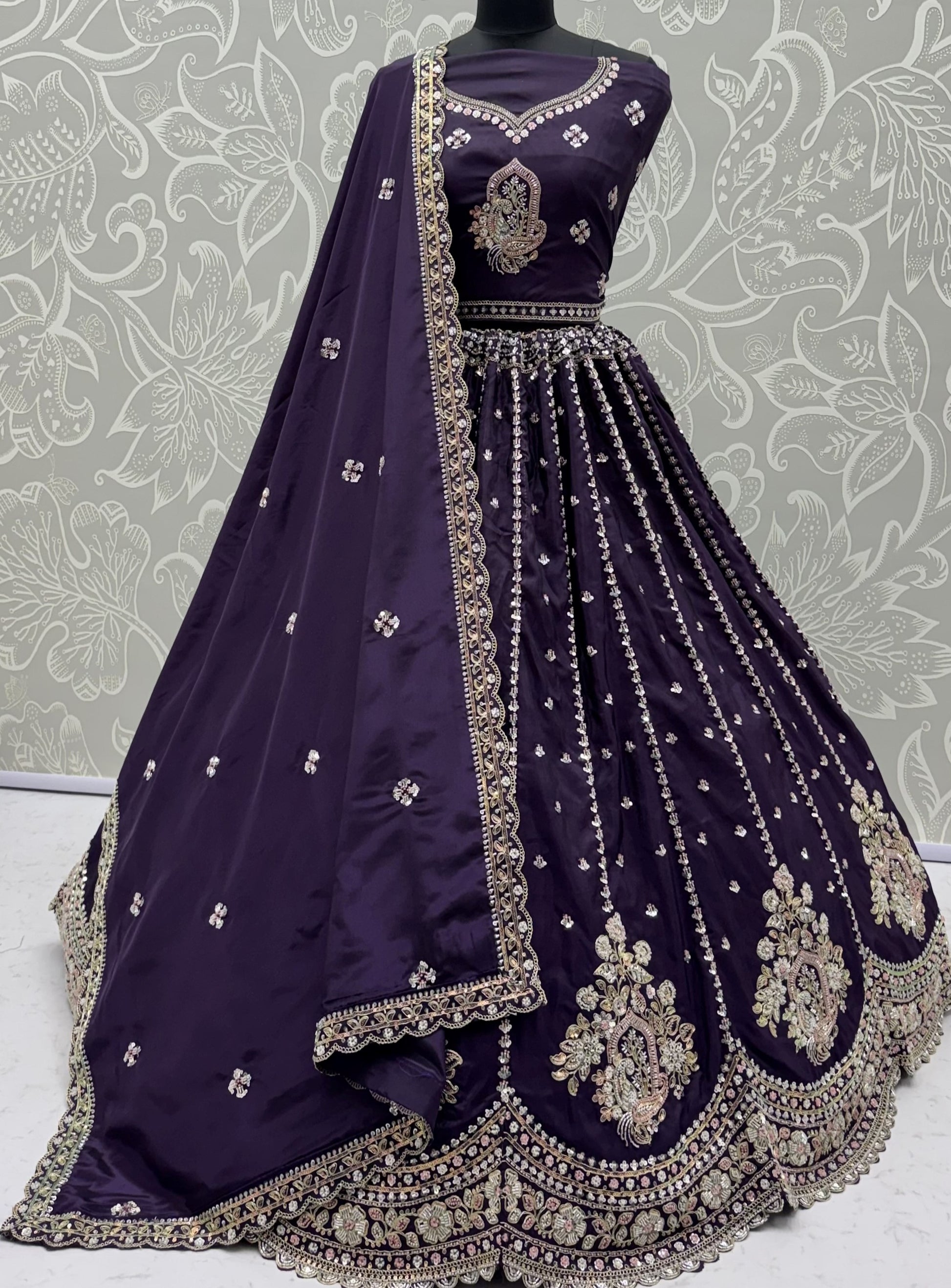 Charming Purple Embroidered Silk Wedding Wear Lehenga Choli With Dupatta