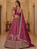 Stunning Rani Pink Embroidery Silk Wedding Wear Lehenga Choli With Dupatta