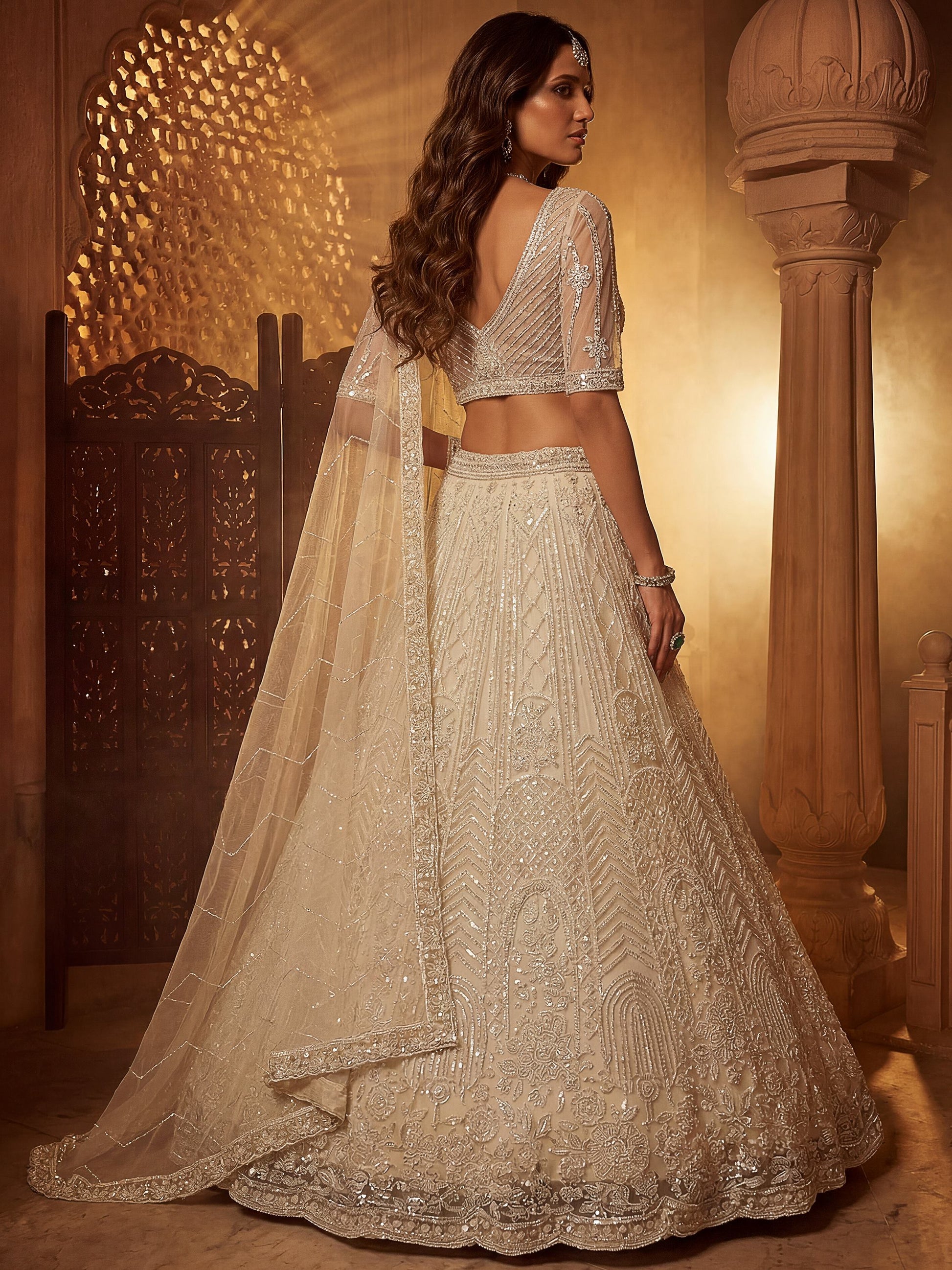Attractive Off-White Beads Work Net Wedding Wear Lehenga Choli With Dupatta