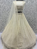Attractive Off-White Beads Work Net Wedding Wear Lehenga Choli With Dupatta