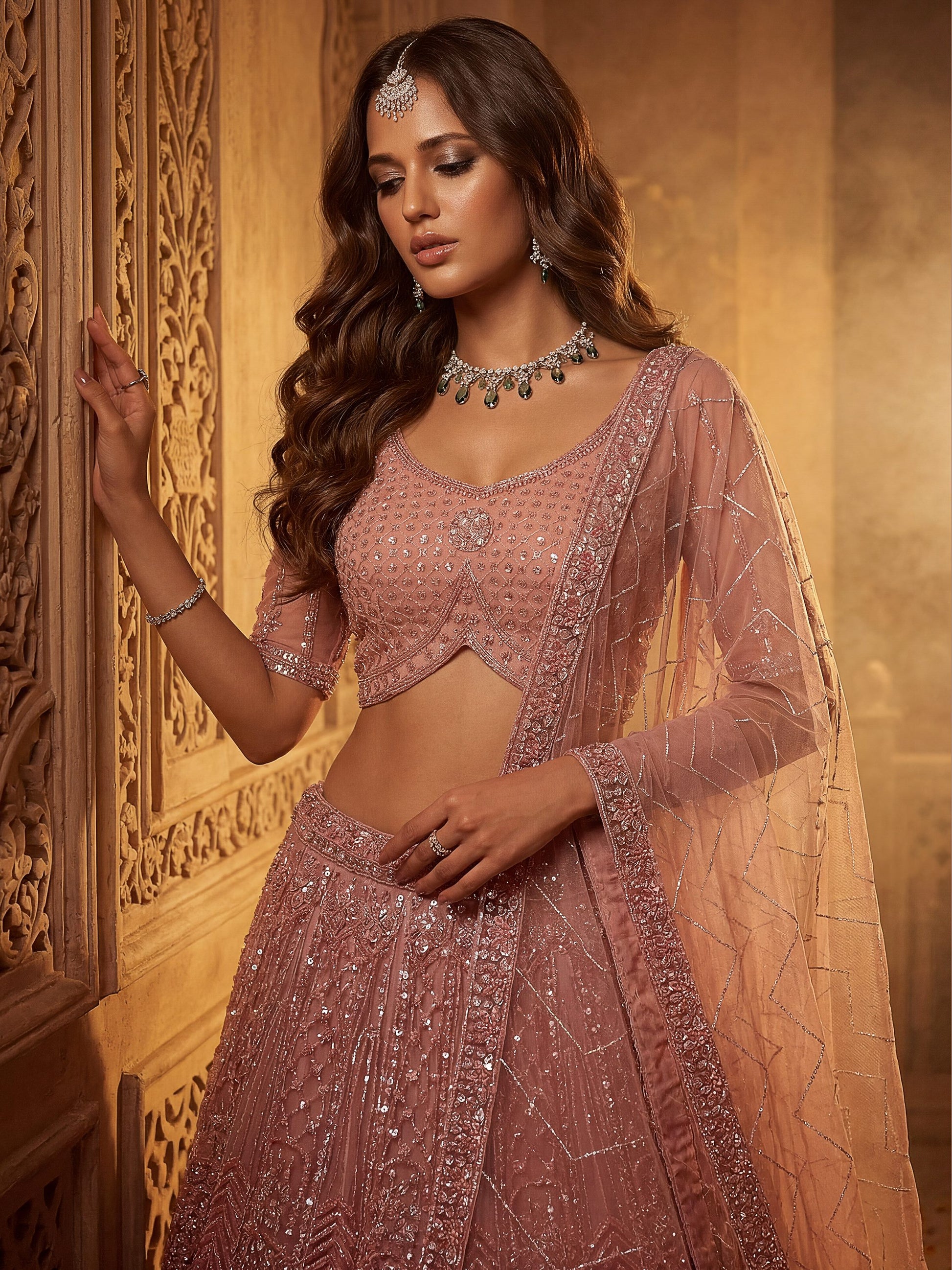 Dazzling Dusty Pink Sequins Net Wedding Wear Lehenga Choli With Dupatta