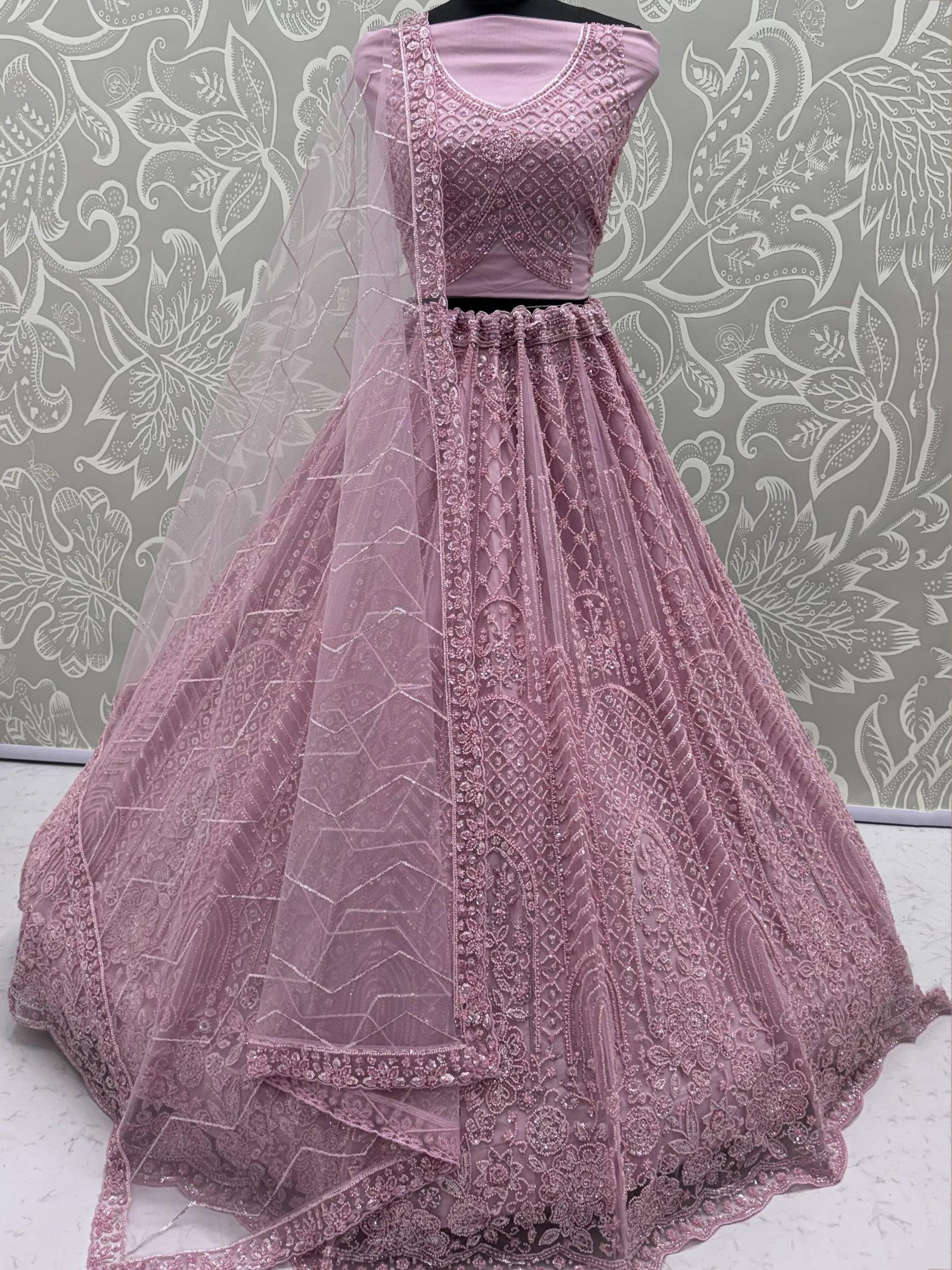 Stylish Lavender Sequins Net Wedding Wear Lehenga Choli With Dupatta