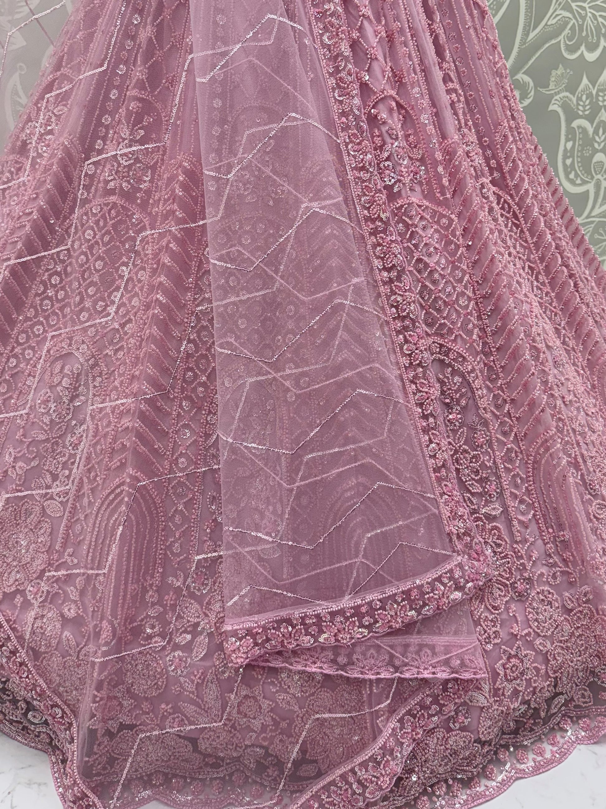 Stylish Lavender Sequins Net Wedding Wear Lehenga Choli With Dupatta