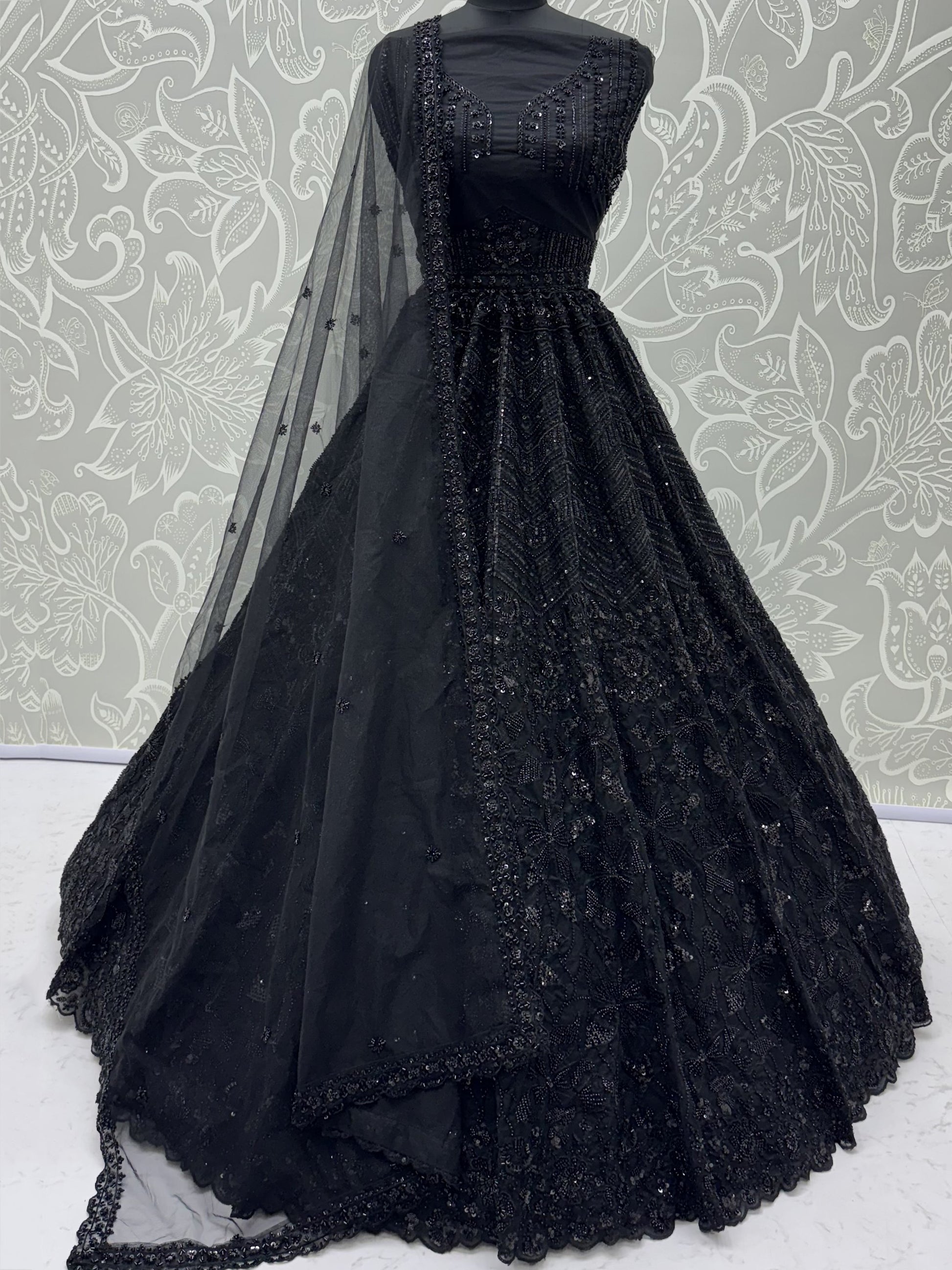 Glowing Black Embroidered Net Wedding Wear Lehenga Choli With Dupatta