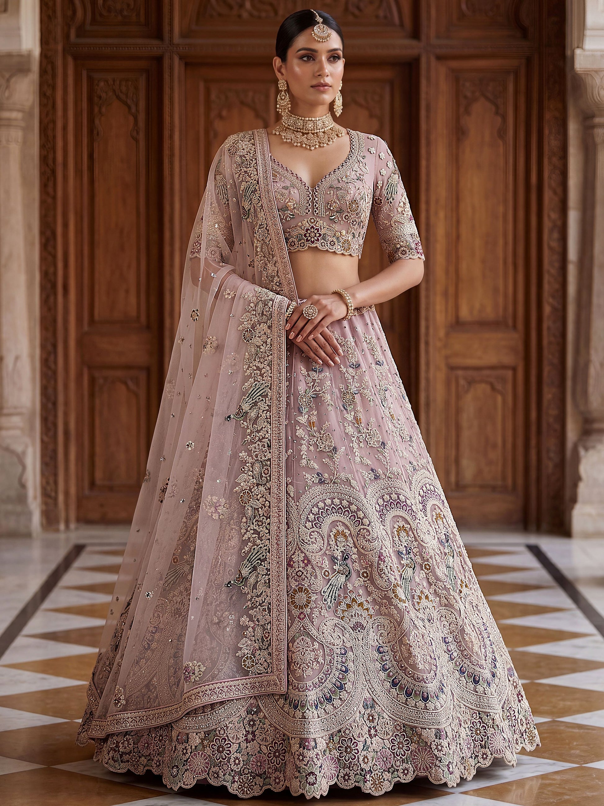 Pretty Mauve Embroidered Net Bridal Wear Lehenga Choli With Dupatta
