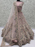 Pretty Mauve Embroidered Net Bridal Wear Lehenga Choli With Dupatta