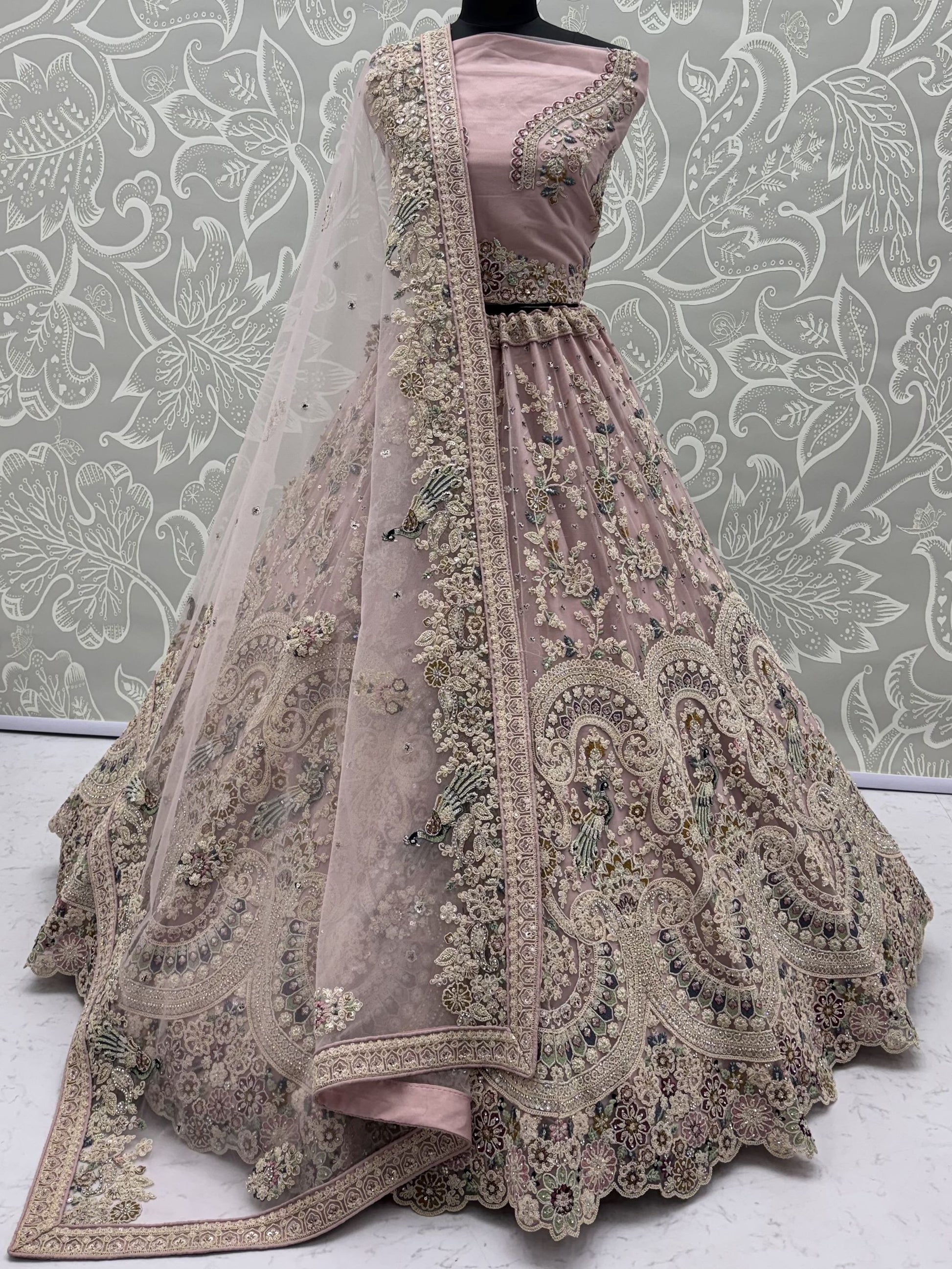 Pretty Mauve Embroidered Net Bridal Wear Lehenga Choli With Dupatta