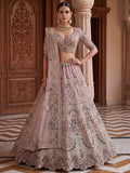 Pretty Mauve Embroidered Net Bridal Wear Lehenga Choli With Dupatta