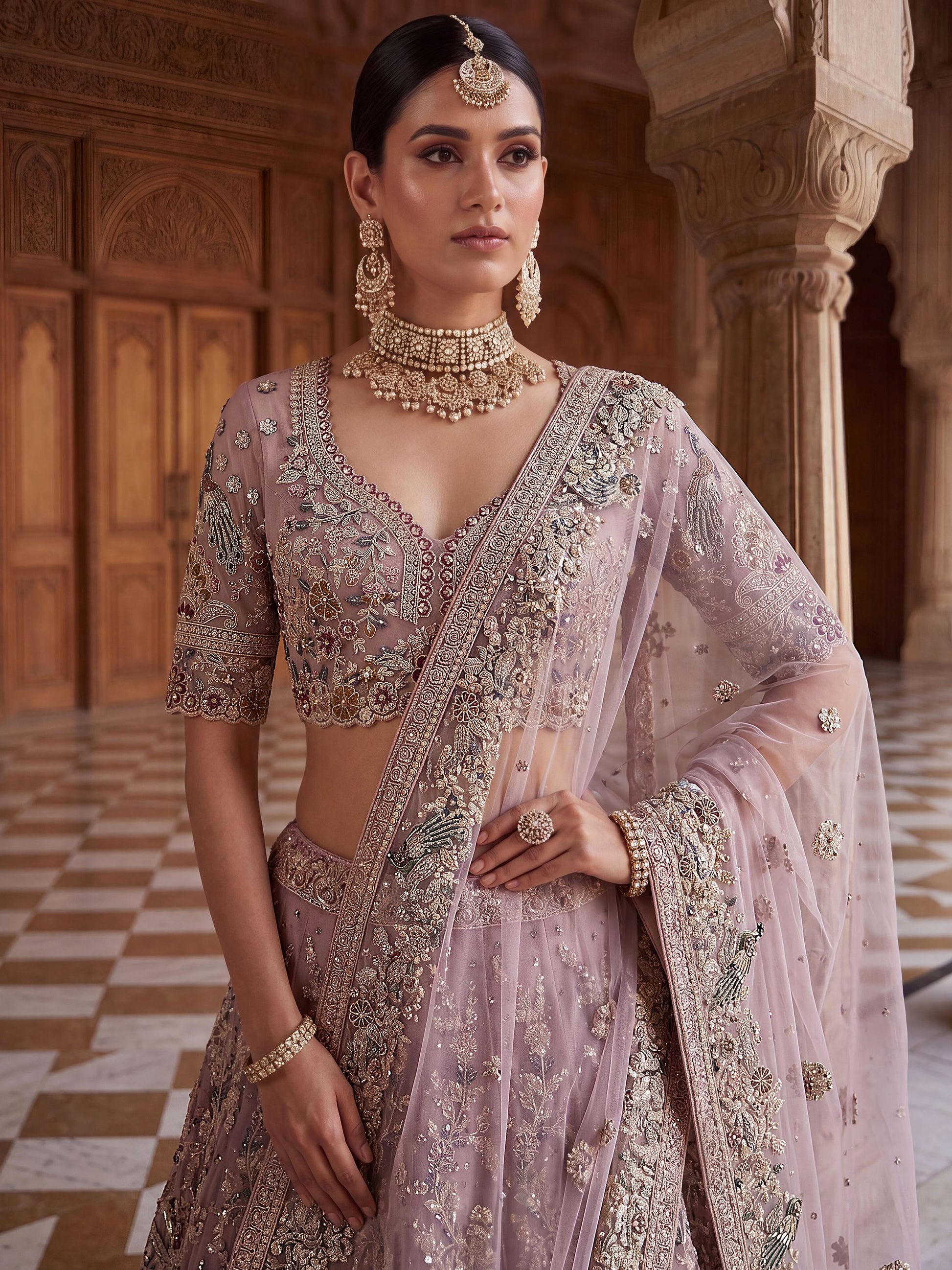 Pretty Mauve Embroidered Net Bridal Wear Lehenga Choli With Dupatta