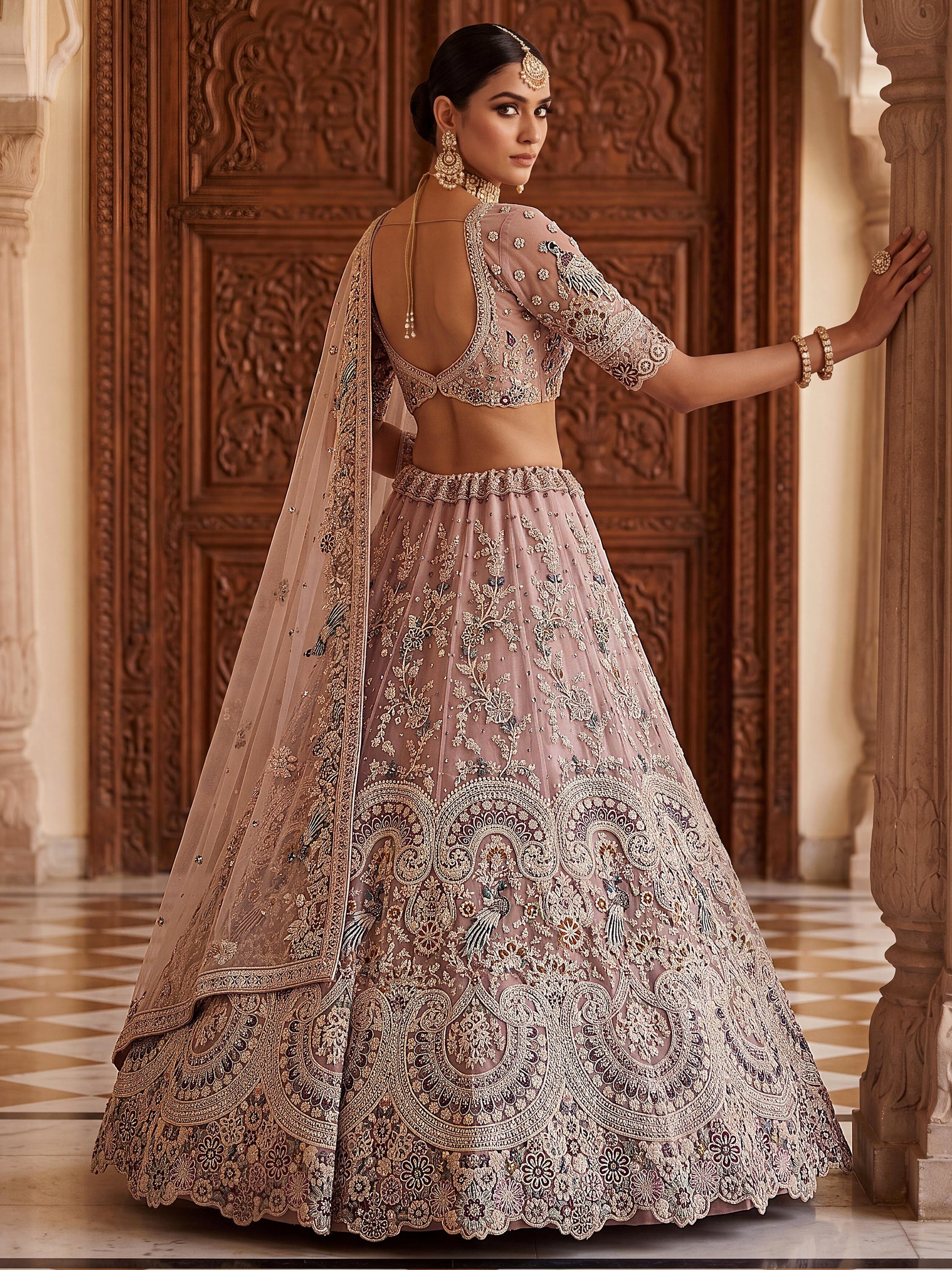 Pretty Mauve Embroidered Net Bridal Wear Lehenga Choli With Dupatta