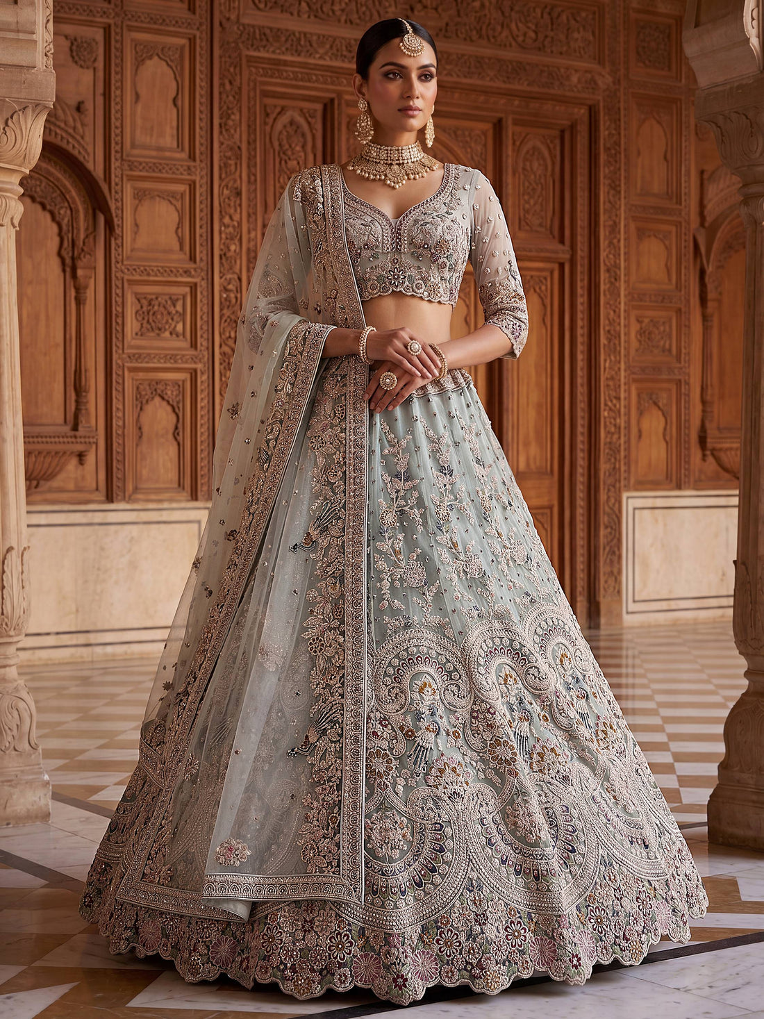 Elegant Sky-Blue Zari Work Net Bridal Wear Lehenga Choli With Dupatta