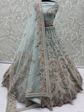 Elegant Sky-Blue Zari Work Net Bridal Wear Lehenga Choli With Dupatta