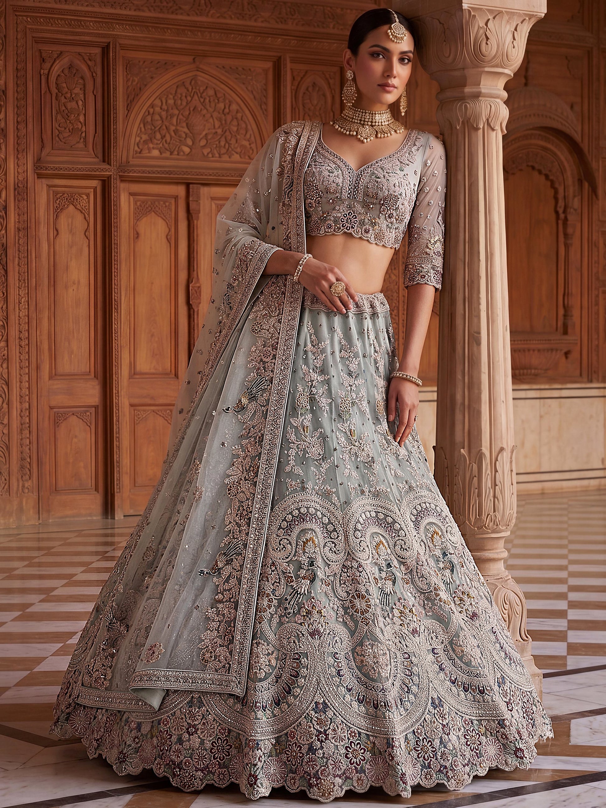 Elegant Sky-Blue Zari Work Net Bridal Wear Lehenga Choli With Dupatta