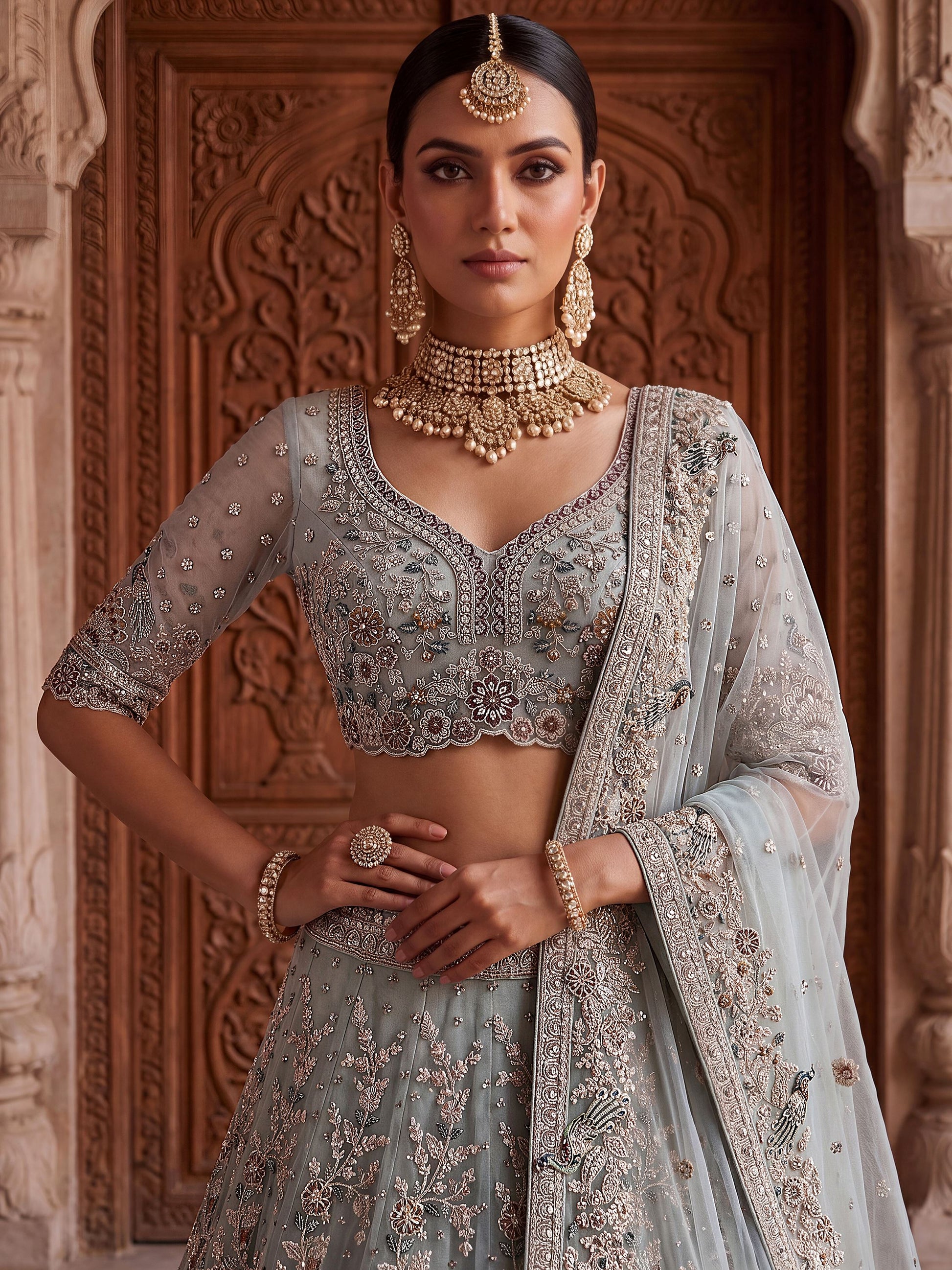 Elegant Sky-Blue Zari Work Net Bridal Wear Lehenga Choli With Dupatta
