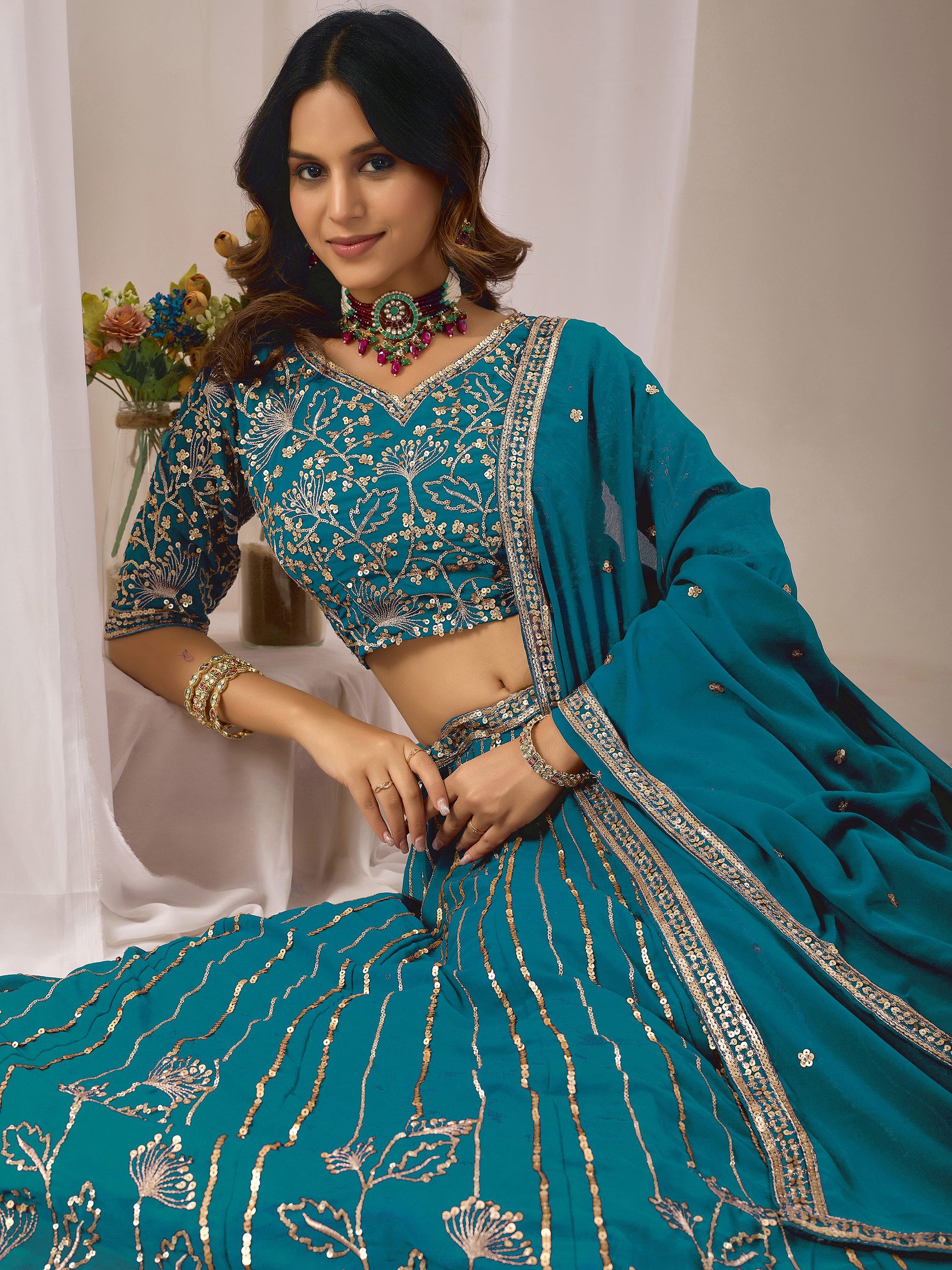 Great Teal Blue Sequins Georgette Wedding Wear Lehenga Choli With Dupatta