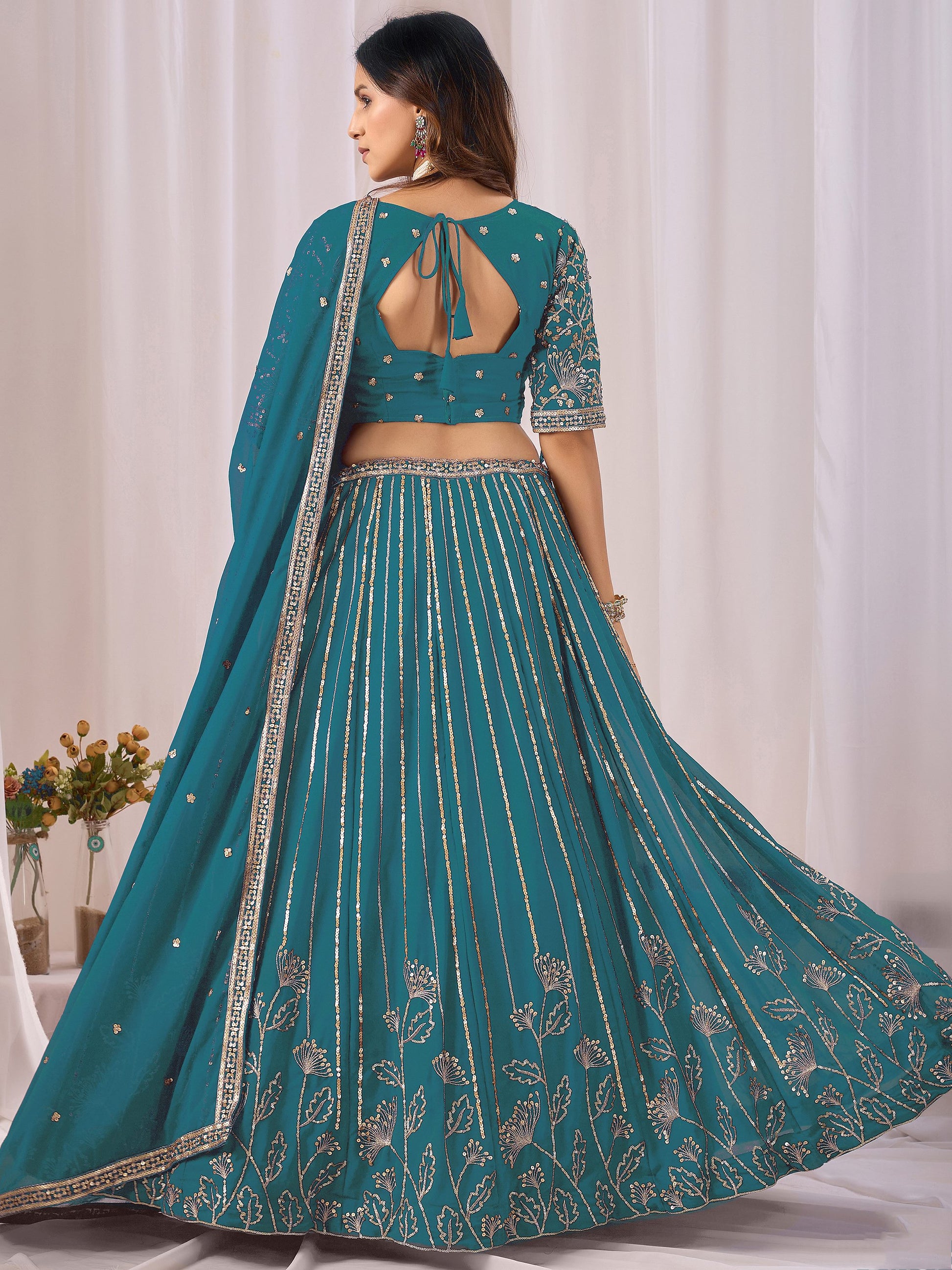 Great Teal Blue Sequins Georgette Wedding Wear Lehenga Choli With Dupatta