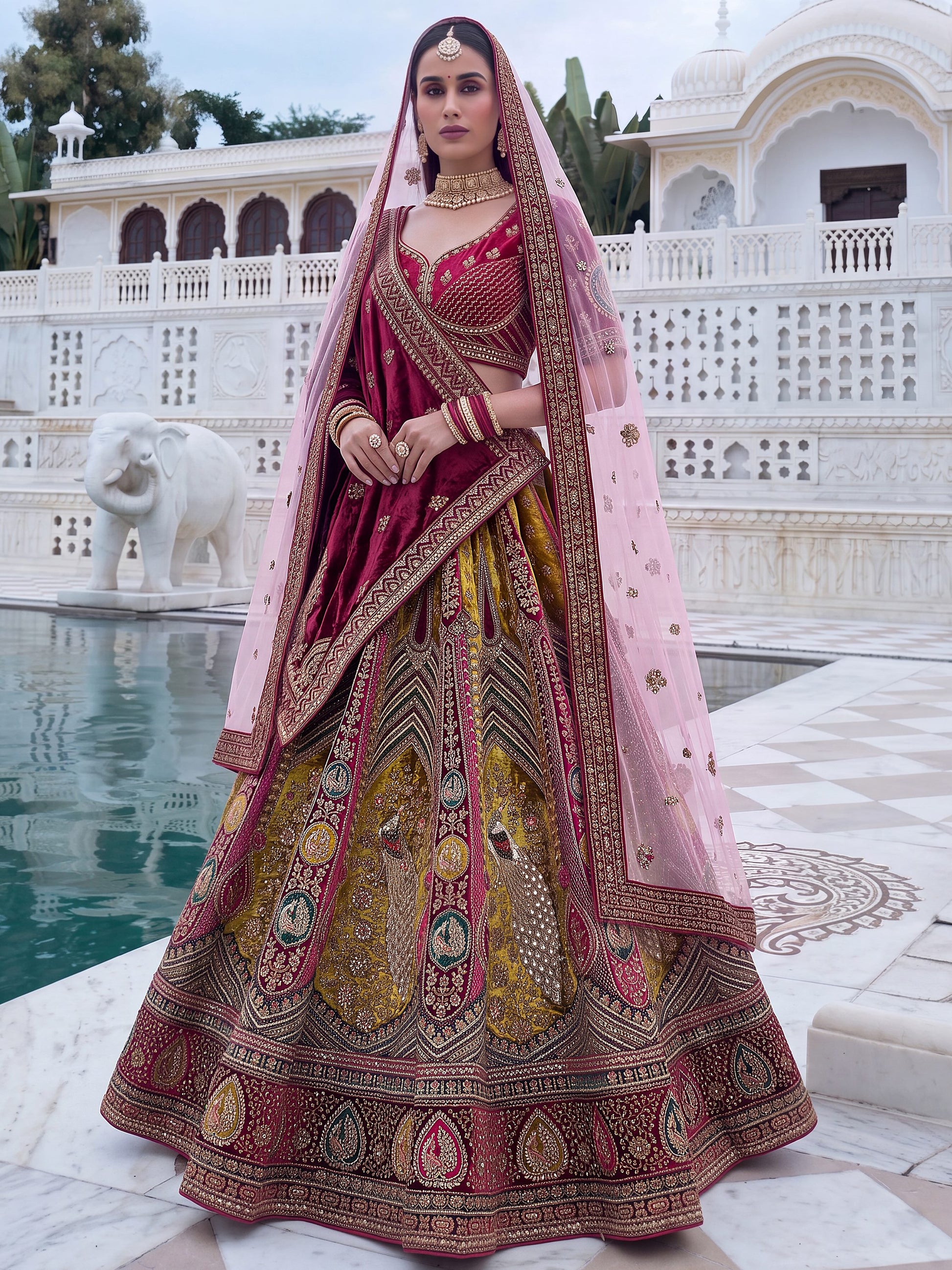 Alluring Maroon Embroidered Velvet Bridal Lehenga Choli With Dupatta 