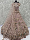 Pretty Pink Handwork Net Wedding Wear Lehenga Choli With Dupatta