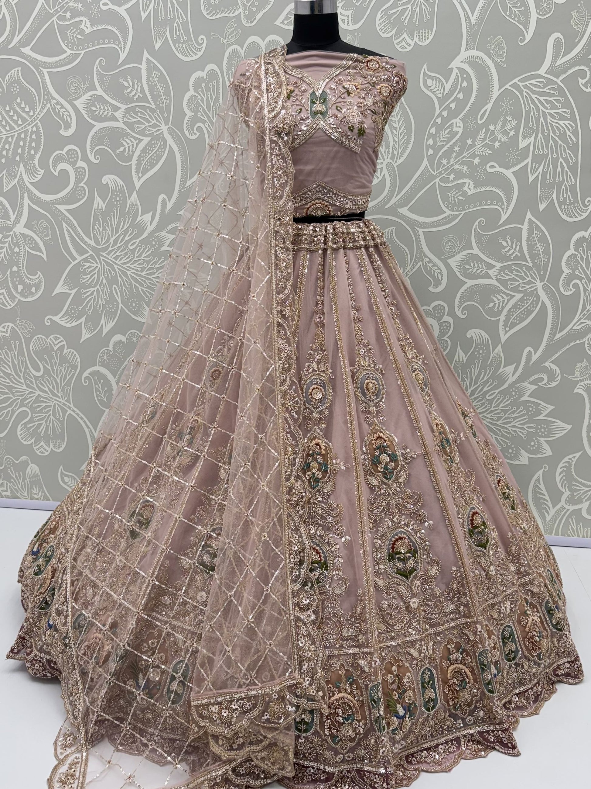 Pretty Pink Handwork Net Wedding Wear Lehenga Choli With Dupatta