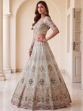 Graceful Mint Green Zari Work Net Wedding Wear Lehenga Choli