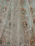 Graceful Mint Green Zari Work Net Wedding Wear Lehenga Choli