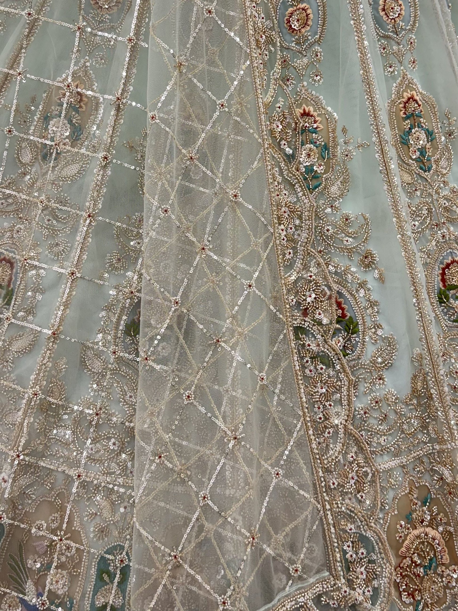 Graceful Mint Green Zari Work Net Wedding Wear Lehenga Choli