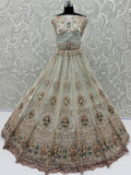 Graceful Mint Green Zari Work Net Wedding Wear Lehenga Choli