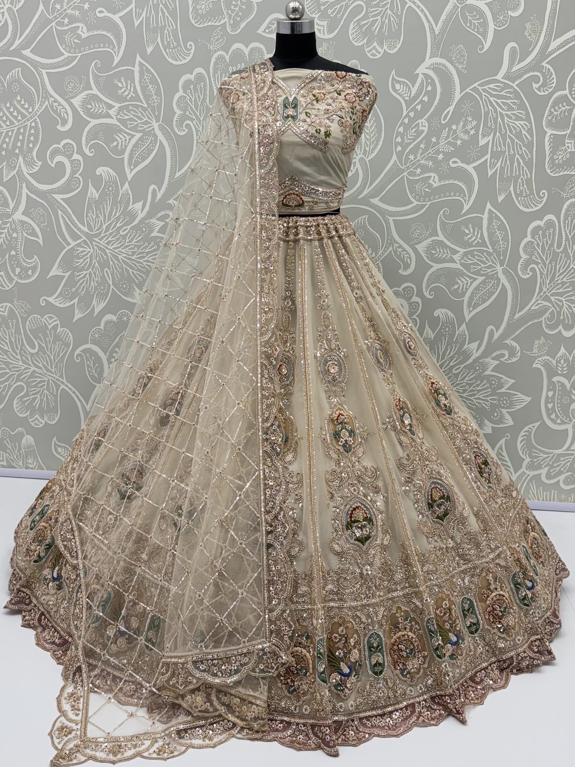 Glowing Beige Handwork Net Engagement Wear Lehenga Choli
