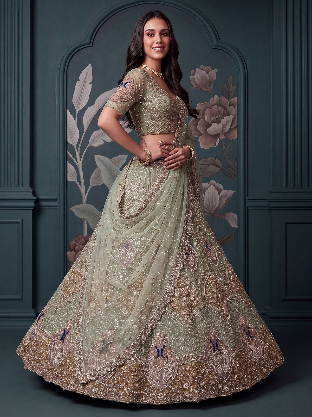 Exquisite Mint Green Zari Work Net Wedding Wear Lehenga Choli