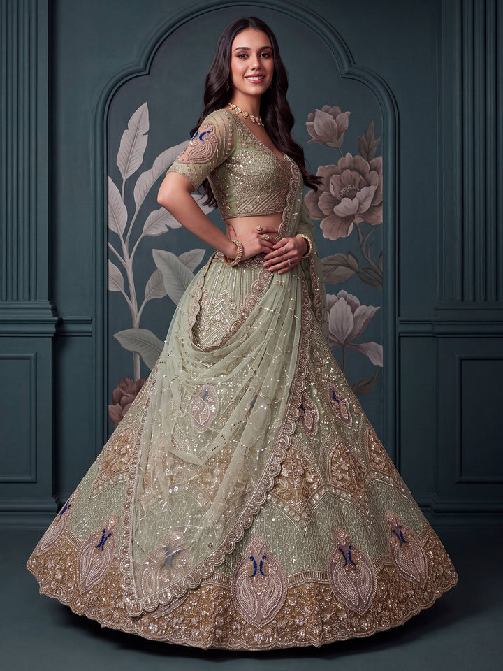 Exquisite Mint Green Zari Work Net Wedding Wear Lehenga Choli