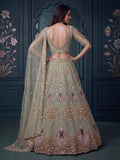 Exquisite Mint Green Zari Work Net Wedding Wear Lehenga Choli
