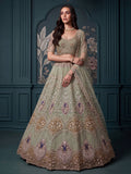 Exquisite Mint Green Zari Work Net Wedding Wear Lehenga Choli