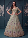 Exquisite Mint Green Zari Work Net Wedding Wear Lehenga Choli