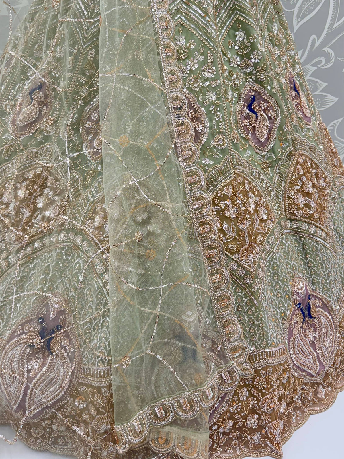 Exquisite Mint Green Zari Work Net Wedding Wear Lehenga Choli