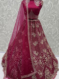 Glamorous Rani Pink Thread Work Net Marriage Wear Lehenga Choli