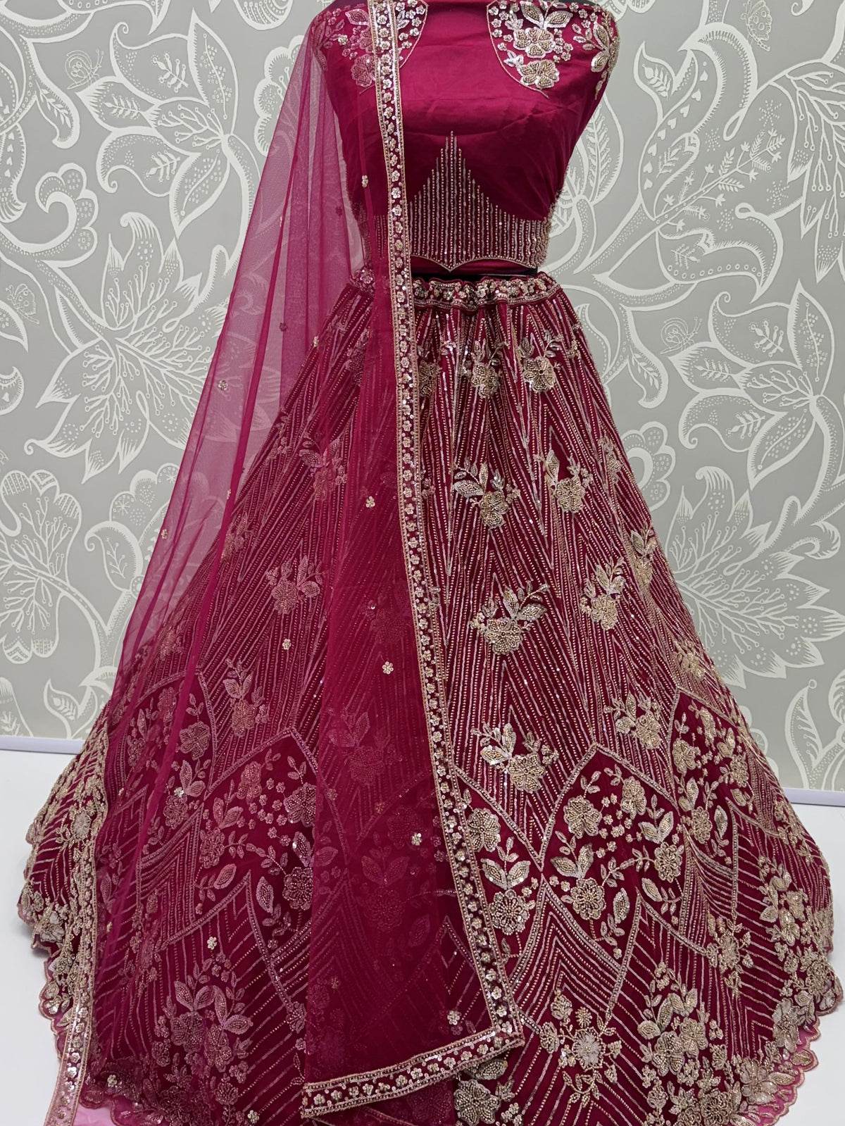 Glamorous Rani Pink Thread Work Net Marriage Wear Lehenga Choli