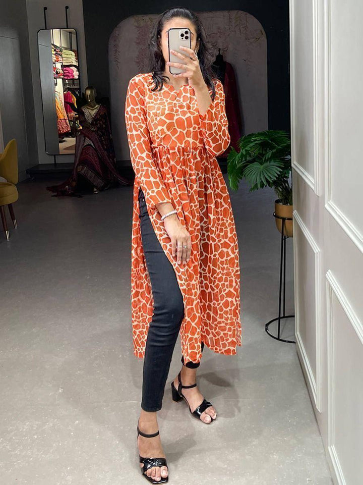 Appealing Orange Animal Printed Chiffon Nayra Cut Festival Wear Kurti