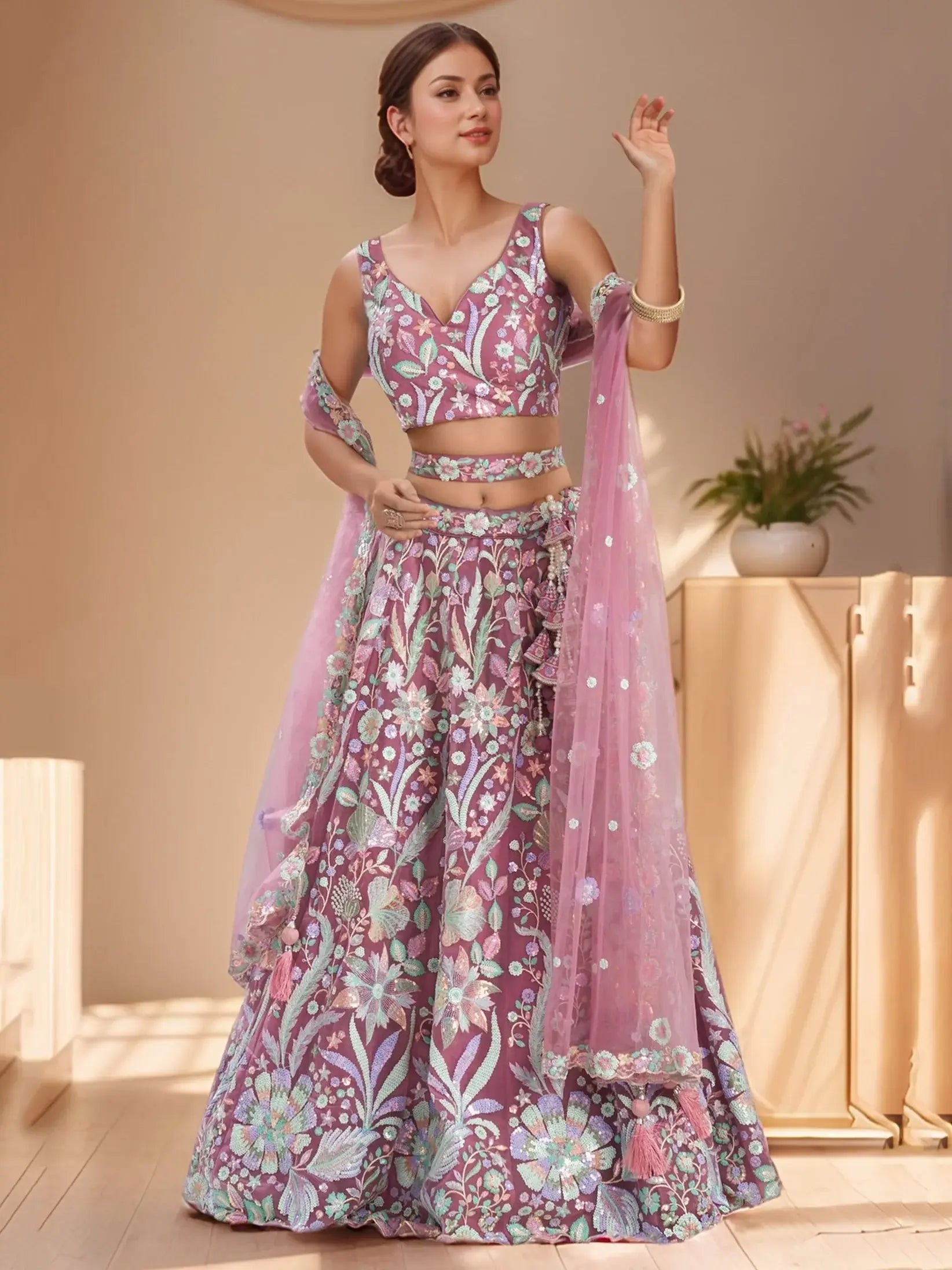 Astonishing Pink Sequins Embroidered Net Reception Wear Lehenga With Blouse
