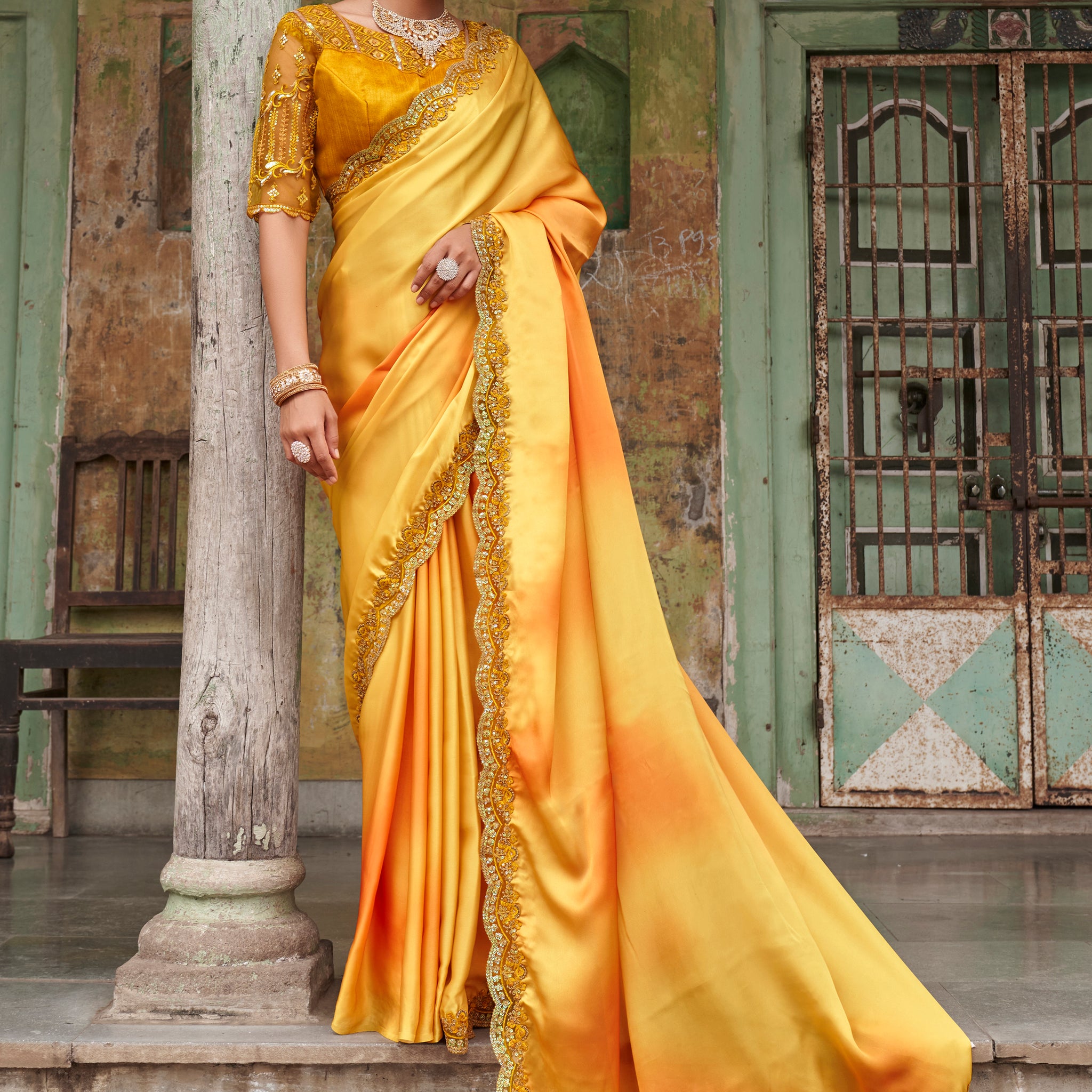 Beautiful Yellow Embroidered Satin Party Wear Saree With Blouse