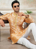 Outstanding Yellow Floral Printed Silk Haldi Wear Men Kurta With Pant Set