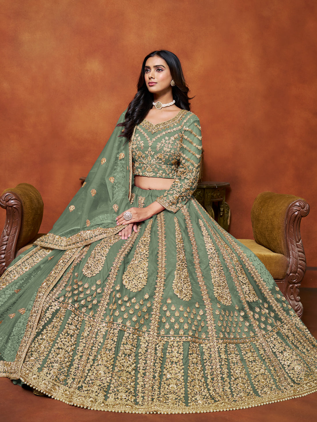 Rich Pista Green Zari Work Net Engagement Wear Lehenga Choli