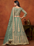 Rich Pista Green Zari Work Net Engagement Wear Lehenga Choli