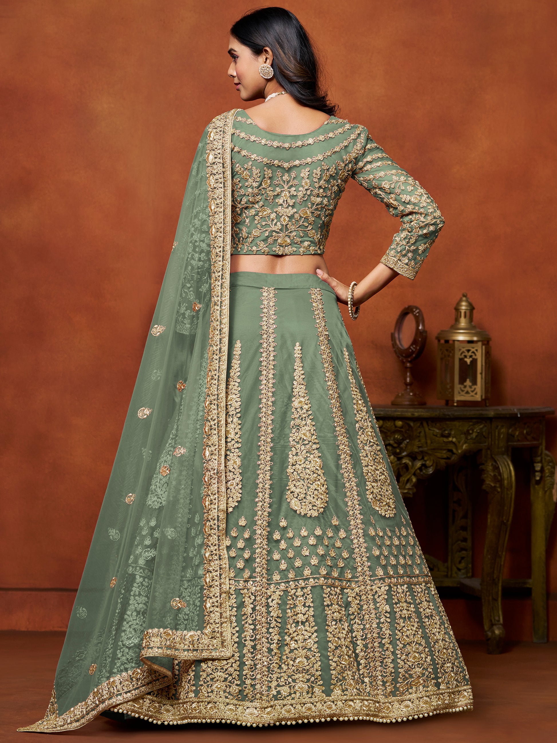 Rich Pista Green Zari Work Net Engagement Wear Lehenga Choli